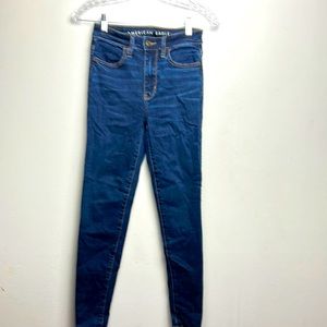 American Eagle high waisted, dark blue wash skinny jeans size 0